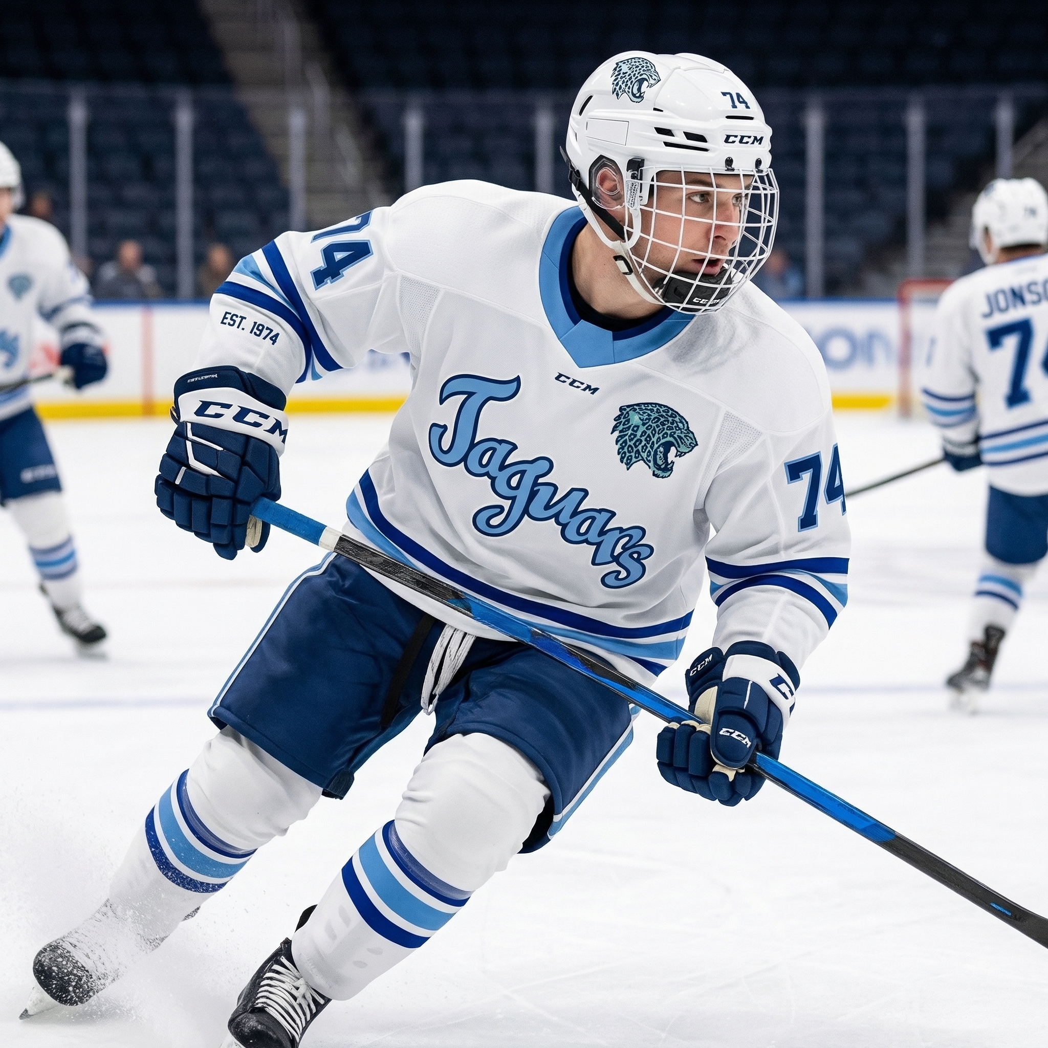 A hockey player in a white and blue Jaguar-themed uniform and helmet skates on the ice during a Bloomington game, holding a hockey stick. Other players are visible in the background.