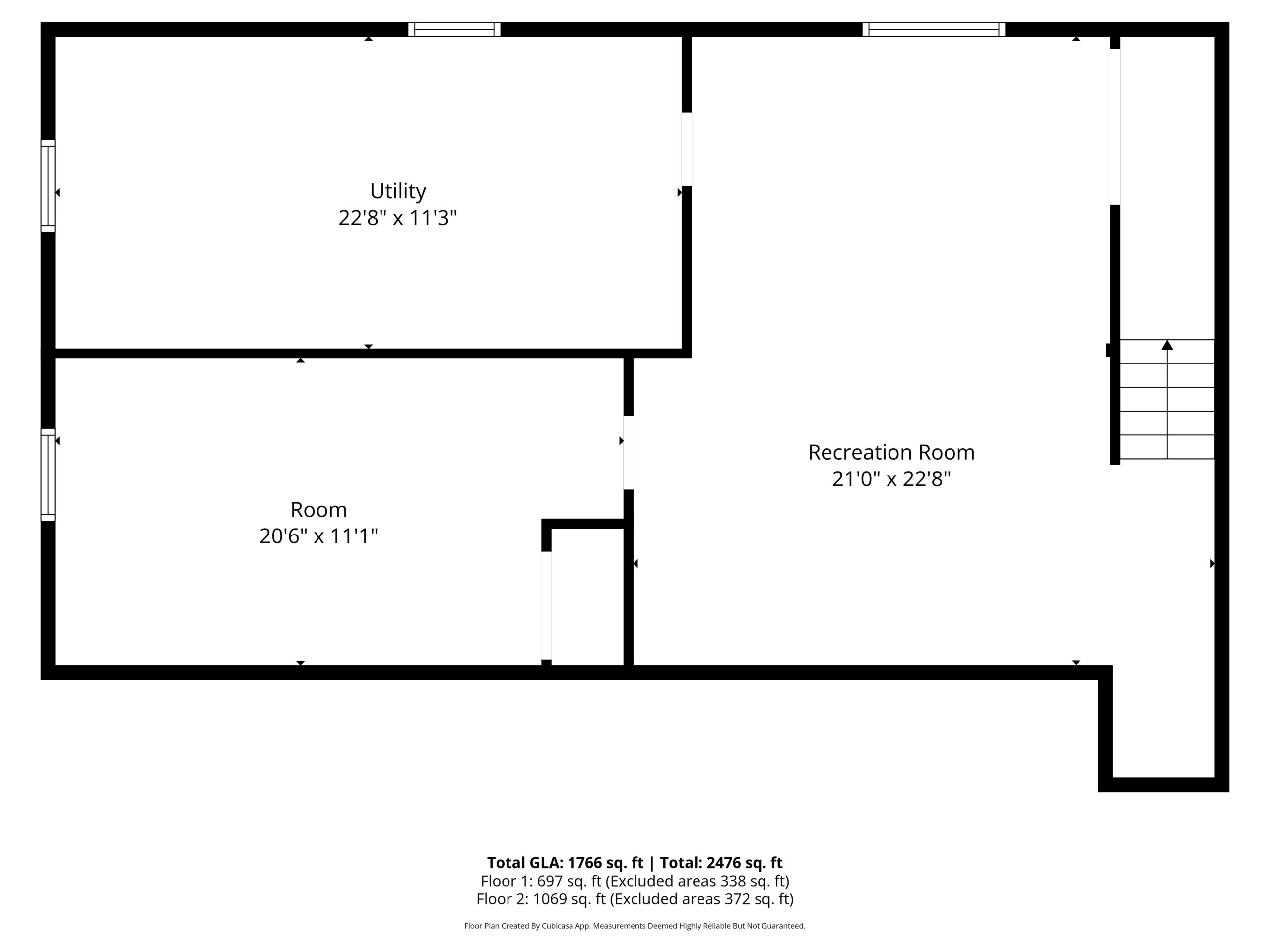 Black and white floor plan showing a large utility room, a smaller room, and a spacious recreation room with stairs on the right. Dimensions and total square footage are labeled for each area.