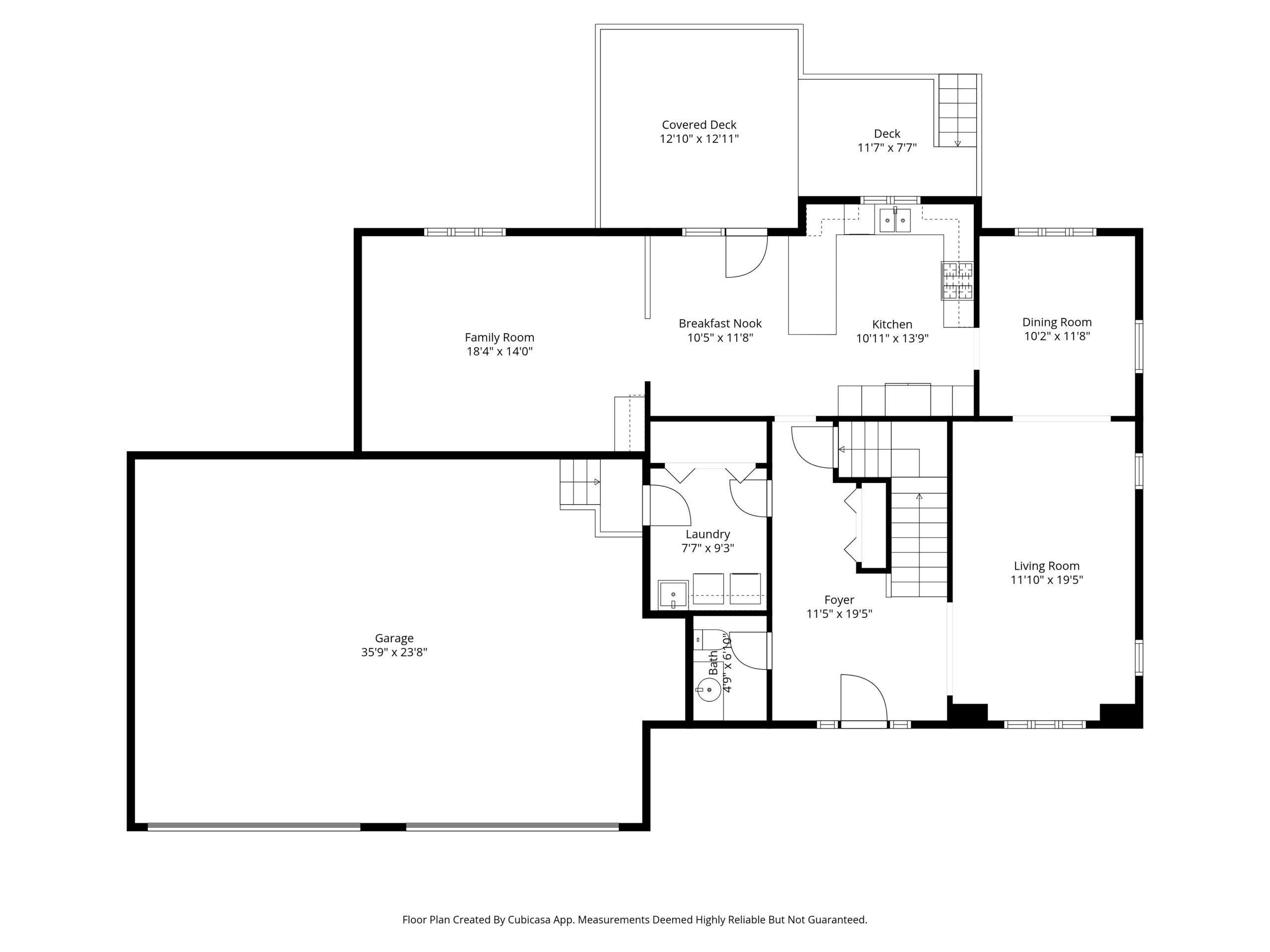 Black and white floor plan for 236 Pine St Lester Prairie MN, featuring a garage, family room, kitchen, breakfast nook, dining room, living room, laundry room, foyer, two decks, stairs, bathroom—all with labeled dimensions.